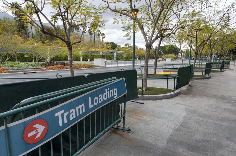 A park tram loading area stands vacant on the first day of the closure of Disneyland and Disney California Adventure theme parks as fear of the spread of coronavirus continue, in Anaheim, California, on March 14, 2020. - The World Health Organization said March 13, 2020 it was not yet possible to say when the COVID-19 pandemic, which has killed more than 5,000 people worldwide, will peak. "It's impossible for us to say when this will peak globally," Maria Van Kerkhove, who heads the WHO's emerging diseases unit, told a virtual press conference, adding that "we hope that it is sooner rather than later". (Photo by DAVID MCNEW / AFP)