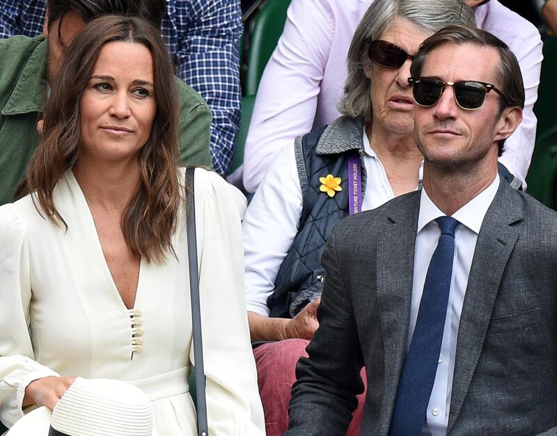 epa06684830 (FILE) - British socialite Pippa Middleton and her husband James Matthews in the Royal Box on Centre Court during the men's semi finals during the Wimbledon Championships at the All England Lawn Tennis Club, in London, Britain, 14 July 2017 (reissued 22 April 2018). According to media reports on 22 April 2018, Pippa Middleton and financier James Matthews are expecting their first child.  EPA/FACUNDO ARRIZABALAGA EDITORIAL USE ONLY/NO COMMERCIAL SALES  EDITORIAL USE ONLY/NO SALES *** Local Caption *** 53647730