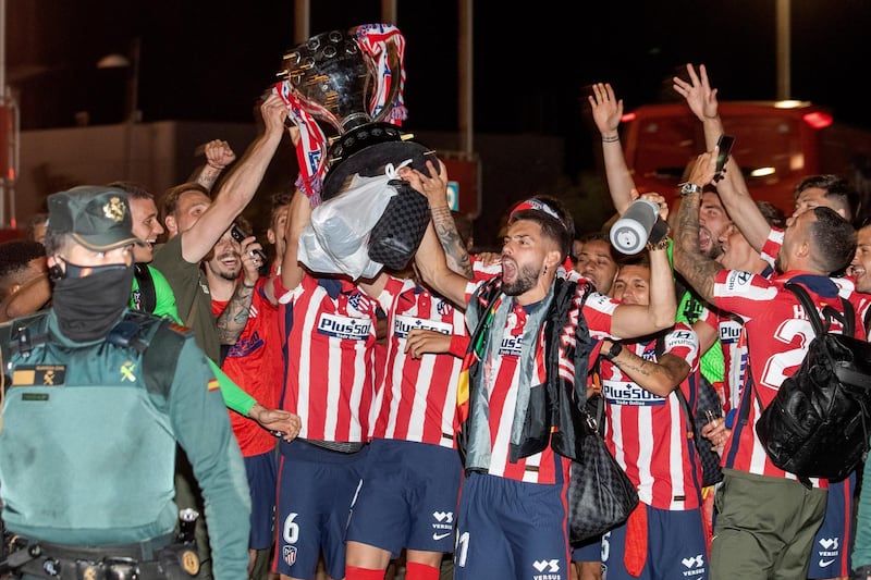 Atletico players celebrate winning La Liga title with supporters at Wanda Sport City. EPA