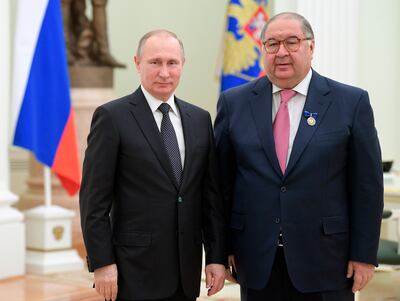 Alisher Usmanov has in the past described his pride at his closeness to Vladimir Putin. AP
