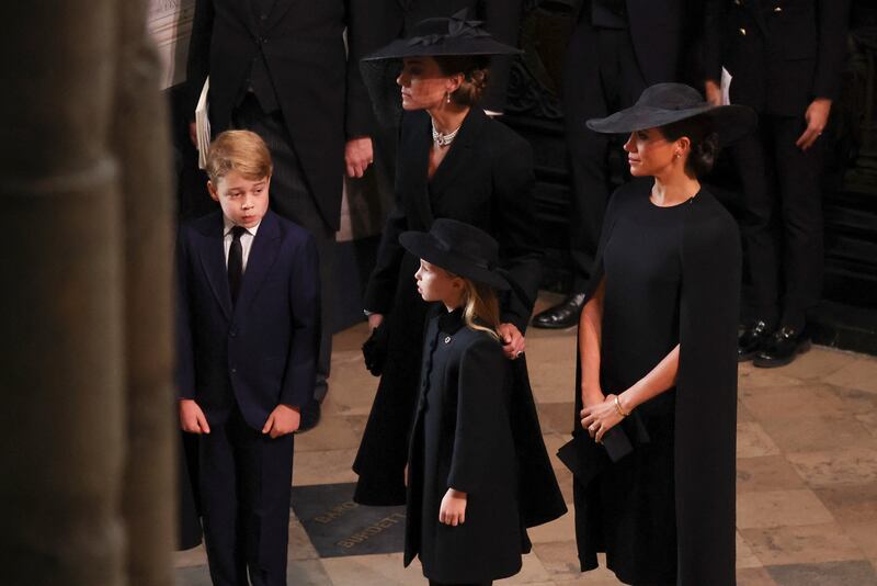 The Princess of Wales and the Duchess of Sussex arrive at Westminster Abbey with Prince George and Princess Charlotte. PA