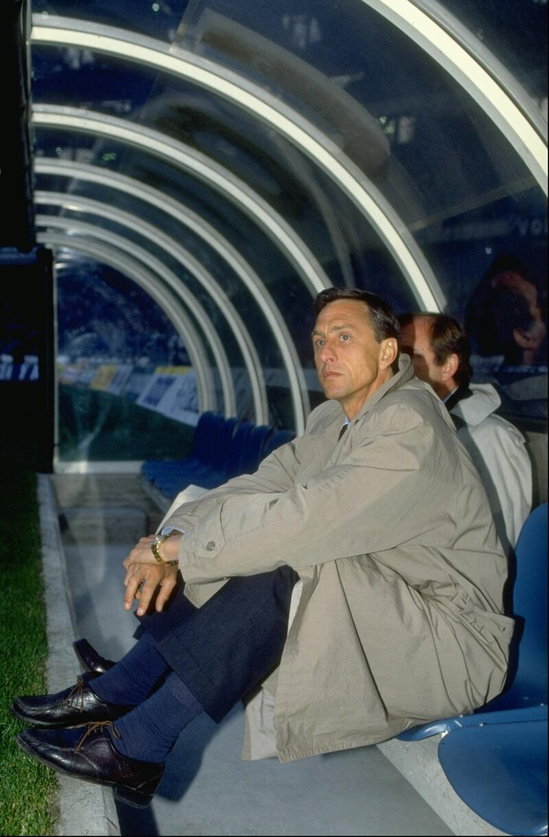 1990-91:  Portrait of Barcelona Manager Johan Cruyff sitting in the dug-out during a match. \ Mandatory Credit: Shaun  Botterill/Allsport