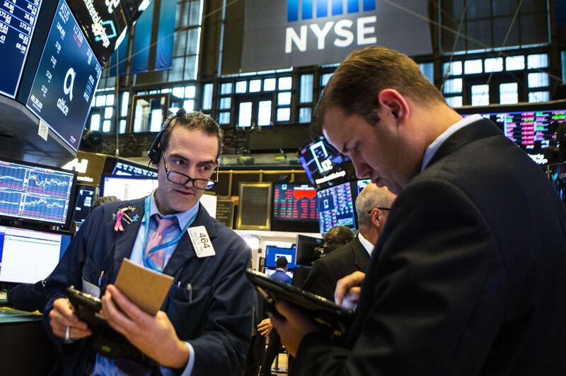 NEW YORK, NY - AUGUST 15: Traders work on the floor of the New York Stock Exchange (NYSE) ahead of the closing bell on August 15, 2018 in New York City. U.S. stocks fight to avoid a hard beat in global markets due to fears of economic chaos. There are some worries that Turkey should join into emerging markets denting global growth.   Eduardo Munoz Alvarez/Getty Images/AFP
== FOR NEWSPAPERS, INTERNET, TELCOS & TELEVISION USE ONLY ==
