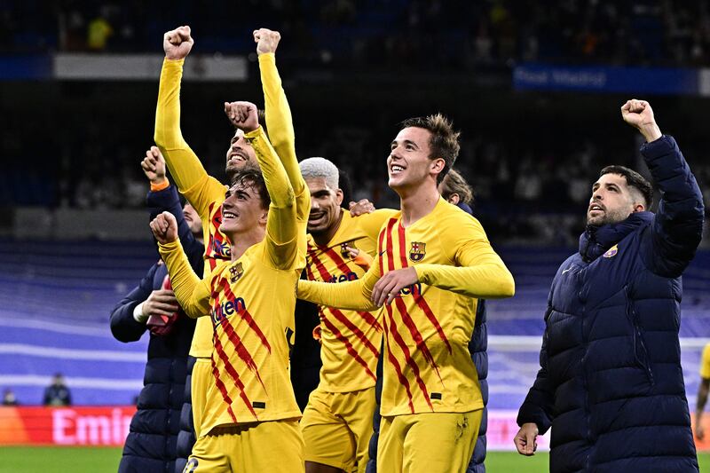 Barcelona players celebrate at the end of the match after beating Real Madrid 4-0. AFP