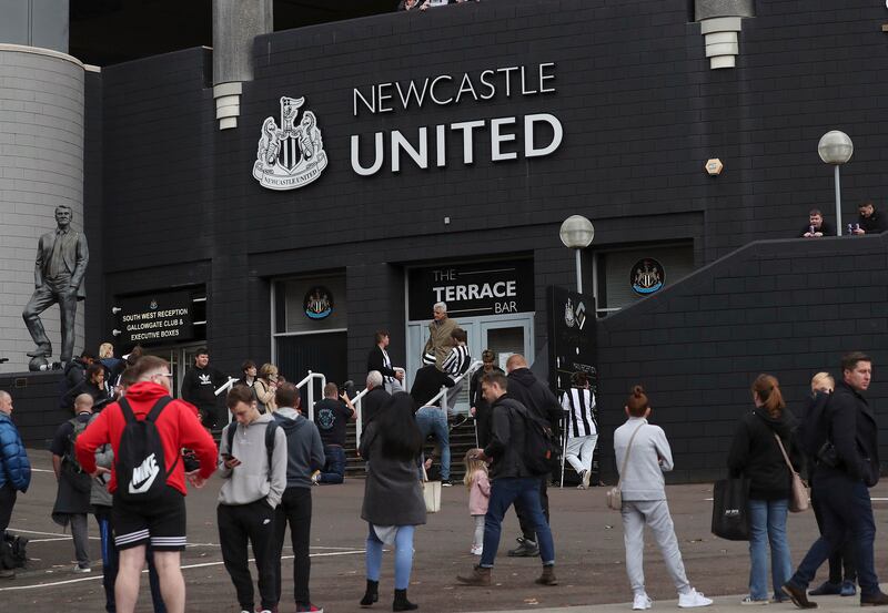 Newcastle United supporters wait for news of the sale of the club to the Saudi sovereign wealth fund. AP