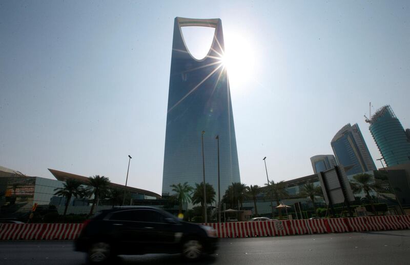 A car drives past the Kingdom Centre Tower in Riyadh, Saudi Arabia, November 12, 2017. Picture taken November 12, 2017. REUTERS/Faisal Al Nasser