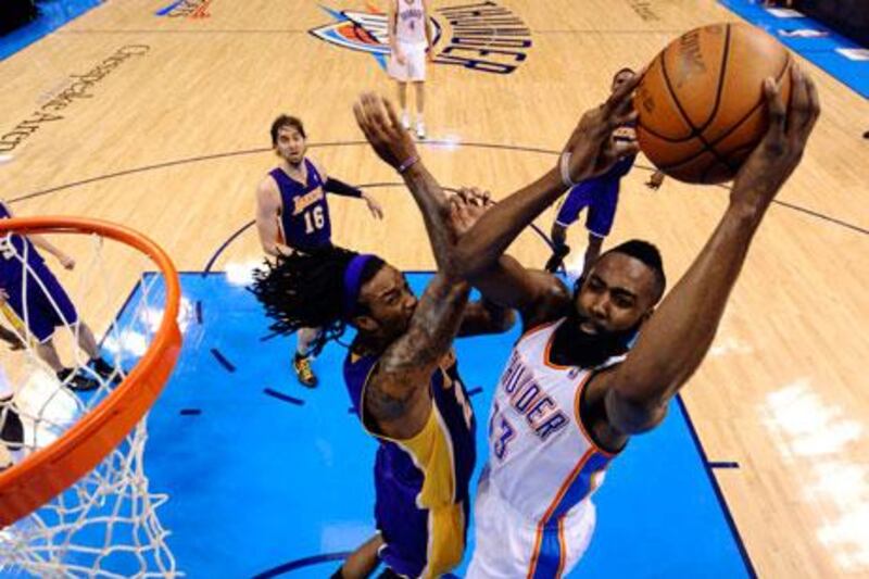 The Oklahoma Thunder, in white, proved to be physically stronger than the Los Angeles Lakers in Game 1 last night.