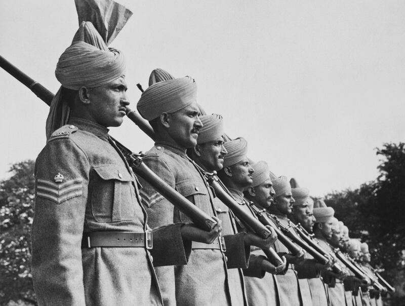 Soldiers of the Royal Indian Army Service Corps on parade at their camp in the north of England, on September 2, 1940. Fox Photos / Hulton Archive / Getty Images