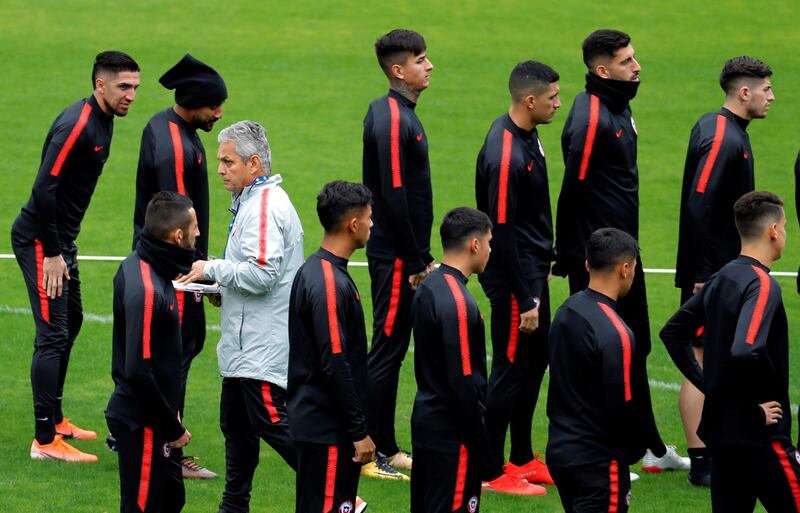 Chile coach Reinaldo Rueda, centre, leads a training session in Sao Paulo. EPA