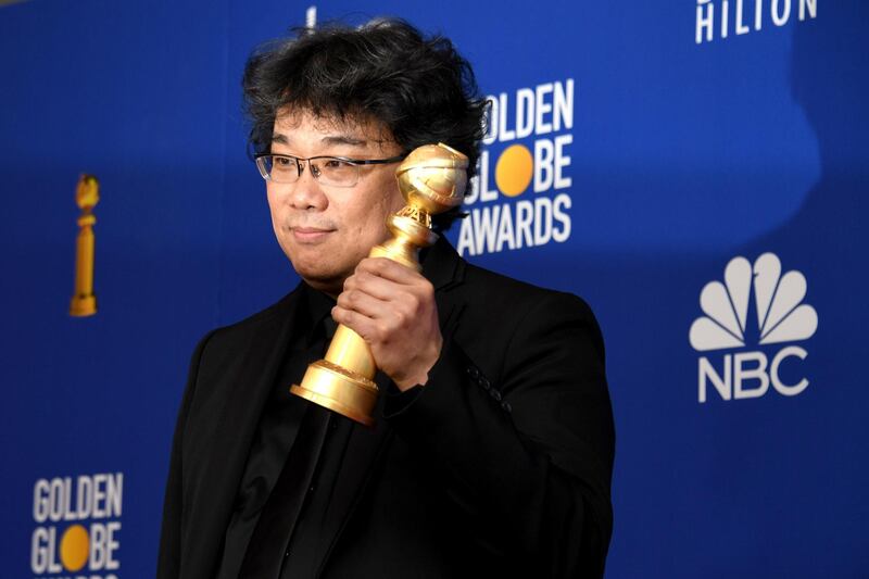 Bong Joon-ho poses with his award for Best Motion Picture - Foreign Language for 'Parasite' during the 77th annual Golden Globe Awards on January 5, 2020, at The Beverly Hilton hotel in Beverly Hills, California. EPA