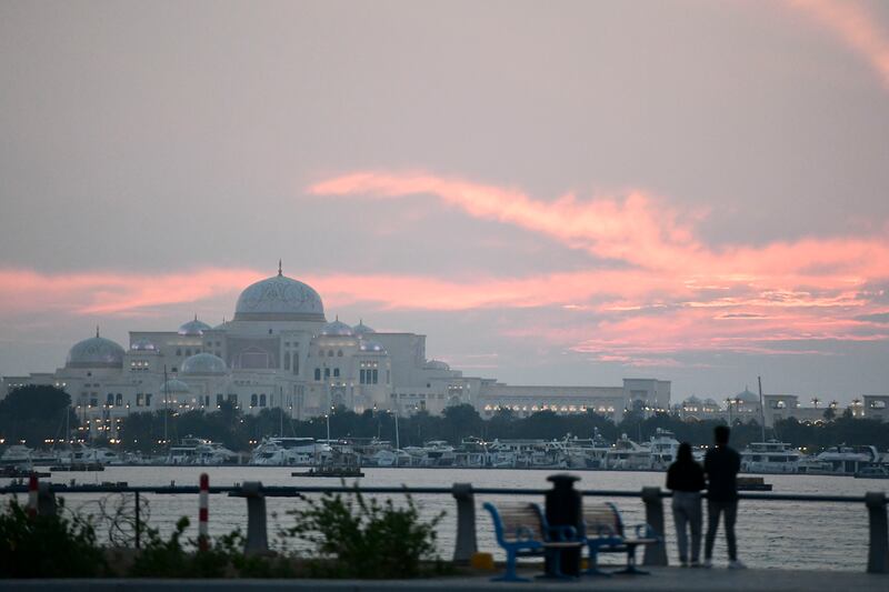 Sunset over Qasr Al Watan during the long weekend holiday at Abu Dhabi Corniche. Khushnum Bhandari / The National
