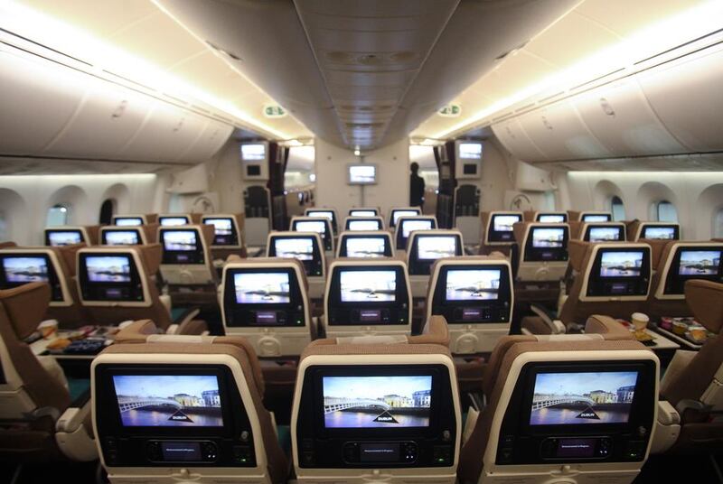 The Economy Smart Seats on Etihad Airways' Boeing 787, which feature the unique ‘fixed wing’ headrest on each seat. Lee Hoagland / The National