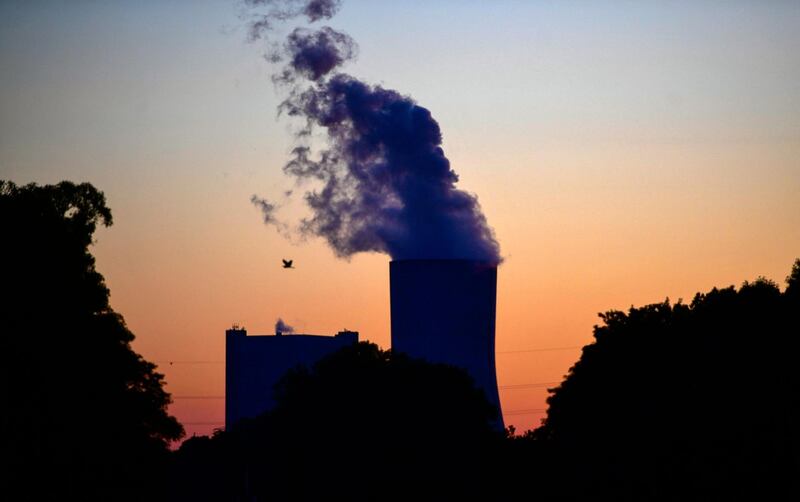 (FILES) In this file photo taken on May 30, 2020 steam rises from the cooling tower of the coal-fired power plant Datteln 4 of Uniper in Datteln, western Germany.  The Group of Seven wealthy nations on May 21, 2021 agreed to end state financing of coal-fired power plants by the end of this year, and to "mostly decarbonise" their electricity supplies in the 2030s. / AFP / Ina FASSBENDER
