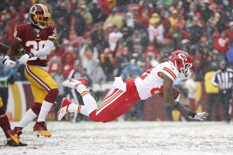 Kansas City's Dwayne Bowe scores a touchdown in the Chiefs' 45-10 win over the Redskins in Washington. Evan Vucci / AP