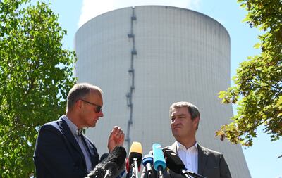 Opposition leaders Friedrich Merz and Markus Soeder visited a nuclear plant in Bavaria to reassure people it was safe. AFP 