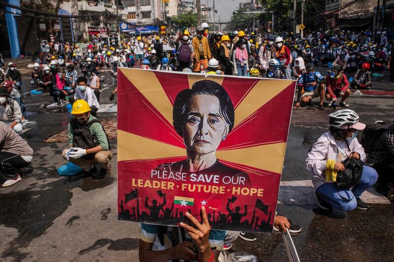 TOPSHOT - Protesters take part in a demonstration against the military coup in Yangon on March 2, 2021. / AFP / STR
