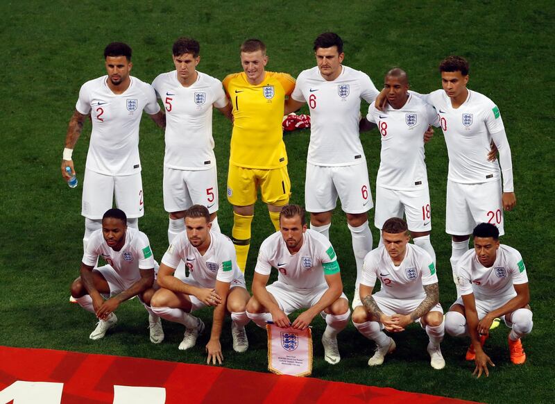 England's players pose prior to the semi final. AP Photo