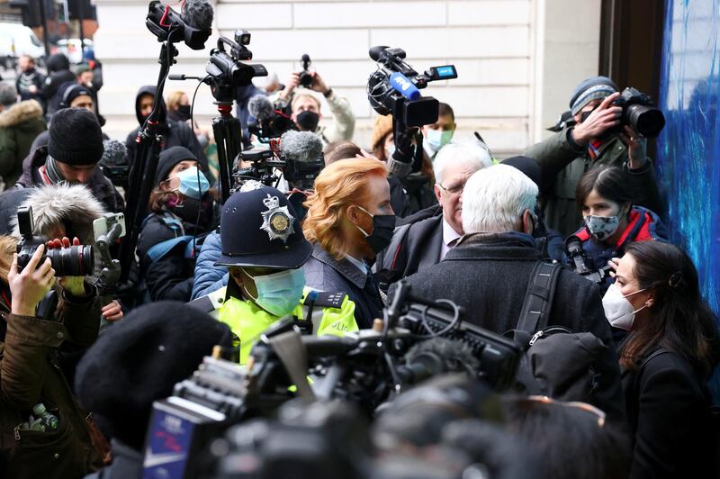 Stella Morris, Kristinn Hrafnsson and WikiLeaks Ambassador Joseph Farrell arrive at the Westminster Magistrates Court. Reuters