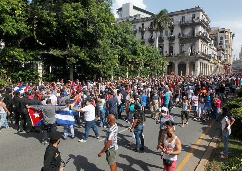 Demonstrators clash during protests against and in support of the government in Havana, Cuba. Reuters.