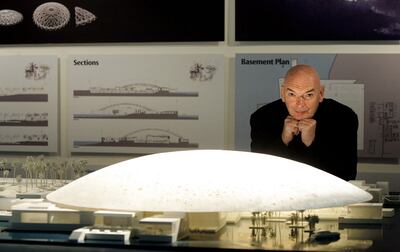 French architect Jean Nouvel with the model of the Louvre Abu Dhabi museum after a signing ceremony in 2007. AFP