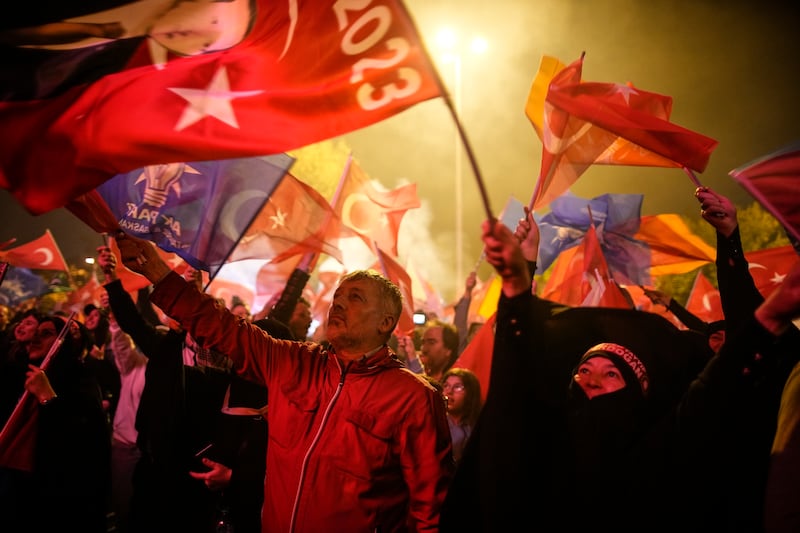 Mr Erdogan's supporters celebrate in Istanbul. AP