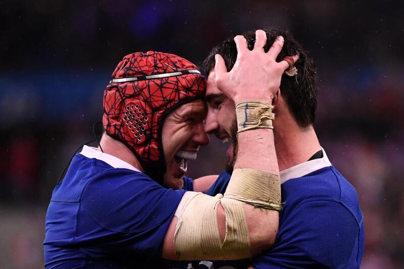 Bernard le Roux, left, and Charles Ollivon celebrate after France defeated England at the Stade de France in the Six Nations rugby tournament, on Sunday, February 2. AFP