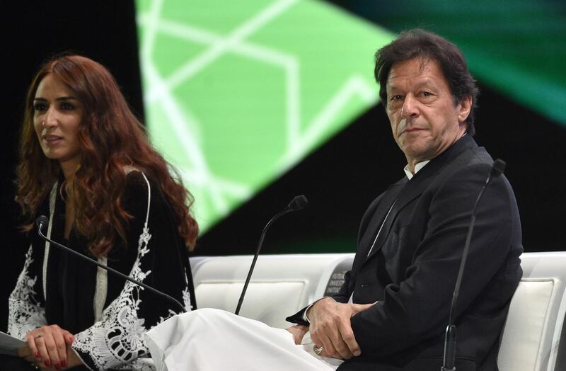 Pakistan Prime Minister Imran Khan waits to take part in a discussion. Reuters