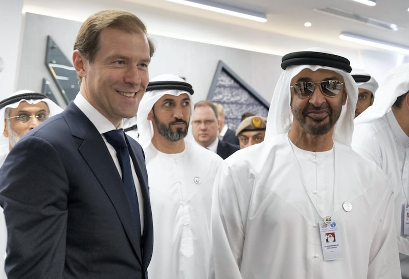 ABU DHABI, UNITED ARAB EMIRATES - February 18, 2019:  HH Sheikh Mohamed bin Zayed Al Nahyan, Crown Prince of Abu Dhabi and Deputy Supreme Commander of the UAE Armed Forces (R) meets with Denis Manturov, Minister of Industry and Trade of the Russian Federation (L), at the Aurus stand during the 2019 International Defence Exhibition and Conference (IDEX), at Abu Dhabi National Exhibition Centre (ADNEC).

( Ryan Carter / Ministry of Presidential Affairs )
---