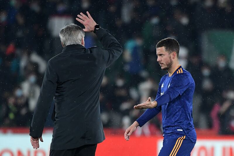 Real Madrid manager Carlo Ancelotti congratulates Eden Hazard after the match. AFP