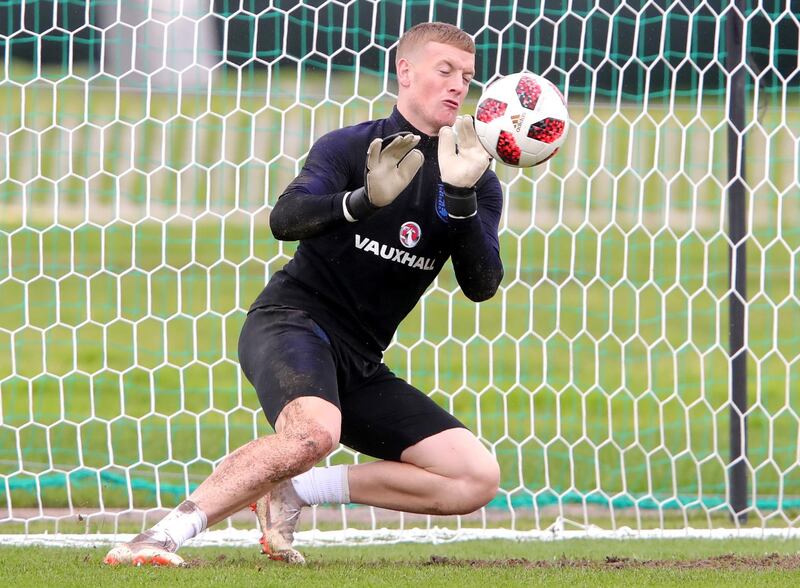 England's Jordan Pickford makes a save during the training session. Getty Images