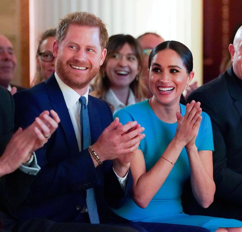 FILE PHOTO: Britain's Prince Harry and his wife Meghan, Duchess of Sussex, cheer during the annual Endeavour Fund Awards at Mansion House in London, Britain March 5, 2020. Paul Edwards/Pool via REUTERS/File Photo
