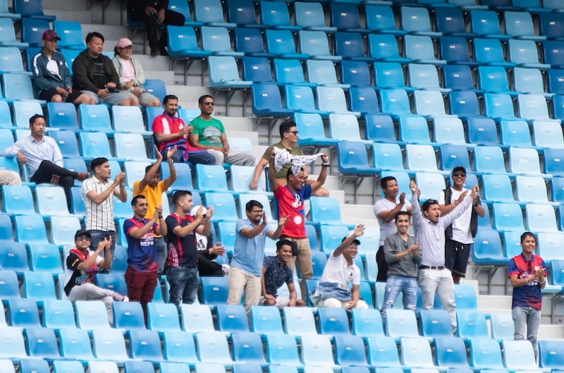 Nepal fans watch the game at Dubai International Stadium.  