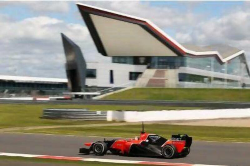 Max Chilton drives around Silverstone for Marussia during the Young Driver Test.