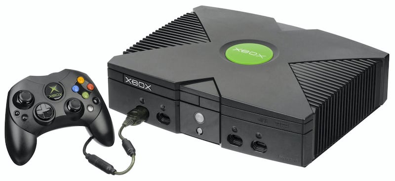 The Xbox was first released in 2001. The Xbox was Microsoft's first foray into the gaming console market and is shown here with the Duke controller, the original pack-in controller, which was later replaced by a smaller 'S' controller. The console is notable for having a built-in hard drive, breakaway controller dongles and an Ethernet port to support Microsoft's online gaming service, Xbox Live. Wikipedia Commons