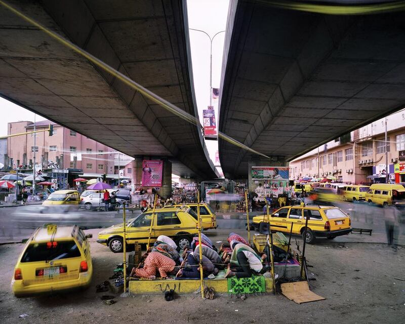 Broad Street, Lagos Island, Nigeria by Martin Roemers, is part of the exhibition Metropolis. Courtesy East Wing Gallery