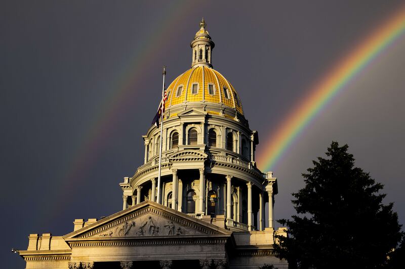 A rainbow forms above the Colorado State Capitol in June 2022. Getty Images