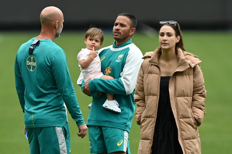 Usman Khawaja with wife Rachel and daughter Aisha during an Australian cricket team training session, at the MCG in Melbourne, Australia, 25 December 2021. EPA