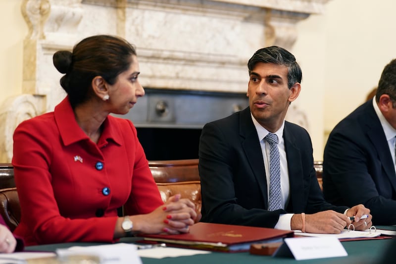 Ms Braverman listens to Britain's Prime Minister Rishi Sunak as he hosts a policing roundtable at 10 Downing Street in October. She courted controversy throughout her time in Cabinet and is believed to have designs on the leadership of the Conservative Party. AP