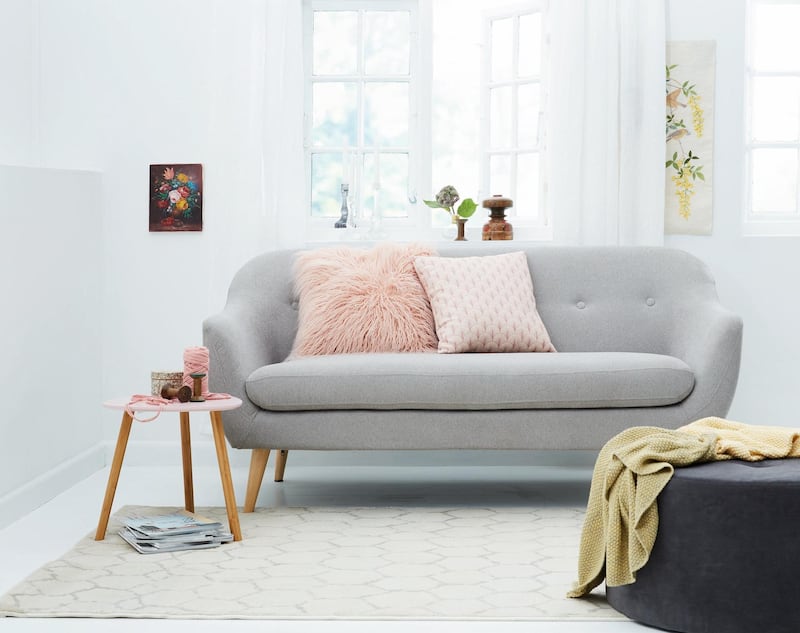 Bjorke 2.5-seater sofa in grey; Dh1,200; fluffy cushion; Dh50; plain cushion; Dh35