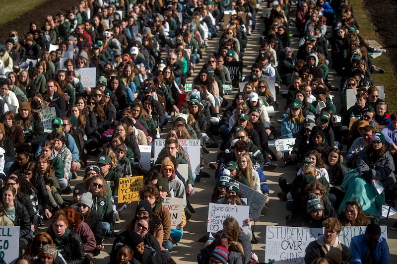 More than 1,000 Michigan State University students  protest at the Capitol in Lansing, Michigan, one week after a gunman killed three students and injured five others.  AP