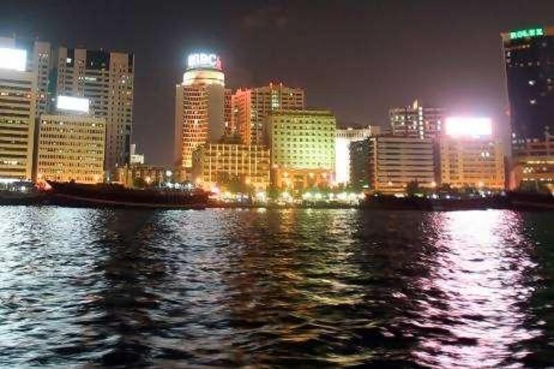 A picture shows the skyline of lining the Dubai Creek in the Gulf emirate on December 25, 2009. AFP PHOTO/KARIM SAHIB *** Local Caption ***  515144-01-08.jpg