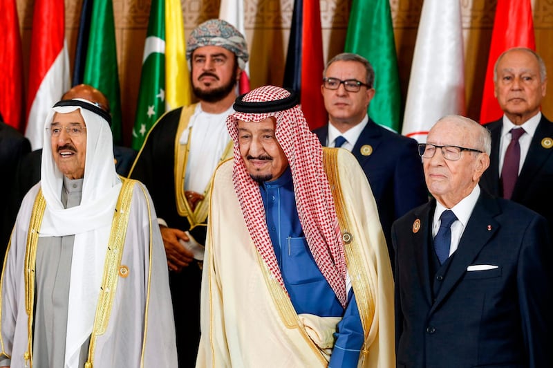 Left to right: Kuwaiti Emir Sheikh Sabah Al-Ahmad Al-Jaber Al-Sabah, Saudi Arabia's King Salman bin Abdulaziz, and Tunisian President Beji Caid Essebsi stand together during the 30th Arab League summit in the Tunisian capital Tunis.  AFP