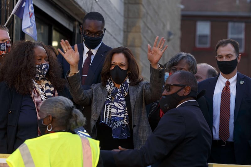 US Democratic Vice Presidential nominee Kamala Harris waves to supporters outside the 14th congressional district office distribution center on September 22, 2020, in Detroit, Michigan. AFP
