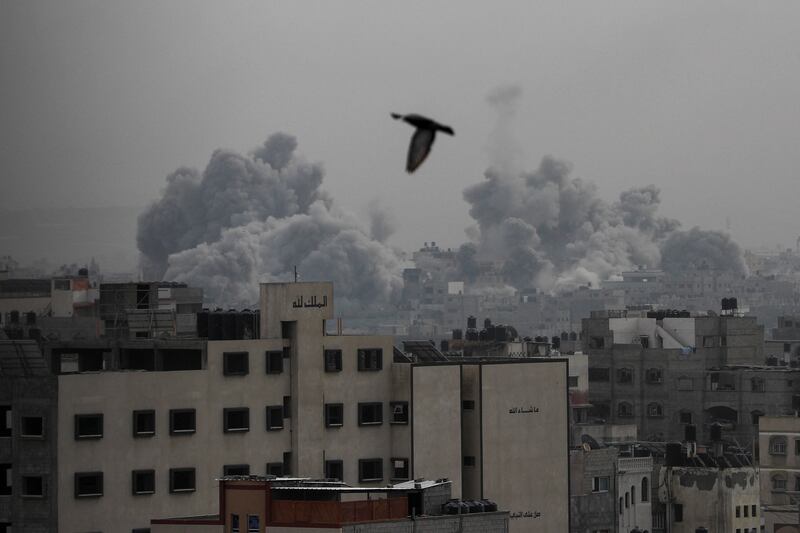 Plumes of smoke rise during Israeli strikes in Gaza city on Sunday. Reuters