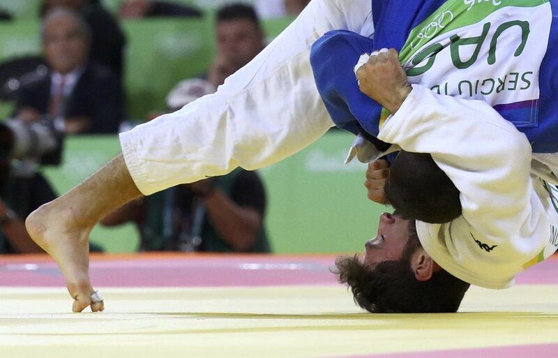 UAE’s Sergiu Toma in action against Italy’s Matteo Marconcini during their men’s 81kg judo bronze medal A match of the Rio 2016 Olympic Games in Rio de Janeiro on August 9, 2016. Kai Pfaffenbach / Reuters
