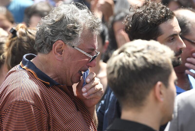 Horacio Sala, father of Emiliano, cries after a vigil. Getty Images