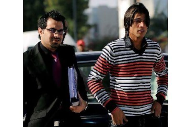 Mohammad Aamer, right, alongside his lawyer, who is confident the ICC will exonerate his client of spot-fixing charges. Manan Vatsyayana / AFP