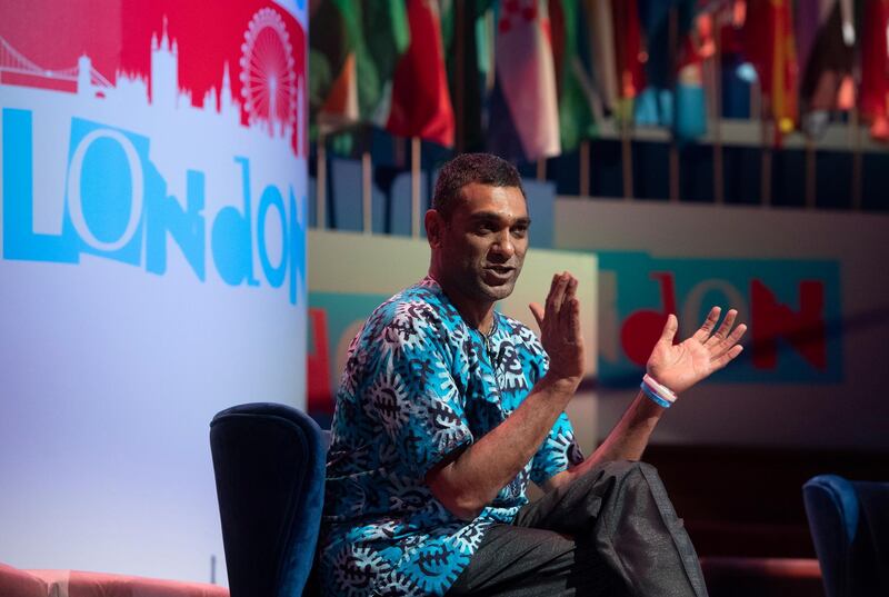 epa07943393 Secretary General of Amnesty International, Kumi Naidoo speaks during a session at the One Young World Summit in the Methodist Hall in London, Britain, 23 October 2019. Over 2,000 young people from over 190 countries gathered for the One Young World Summit, a global forum for young leaders, aiming to create the next generation of more responsible and effective leaders.  EPA/FACUNDO ARRIZABALAGA
