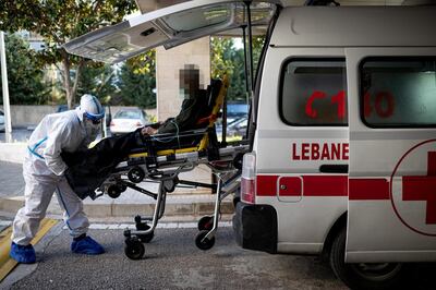[NOTE TO EDITORS: The face of the patient has been blurred to protect identity] ©2021 Tom Nicholson. 23/01/2021. Jounieh, Lebanon. A patient with Coronavirus is transferred from a Lebanese Red Cross ambulance to a hospital in the Jounieh region. Today Lebanon registered 4176 new Coronavirus cases, and 52 deaths. Photo credit : Tom Nicholson