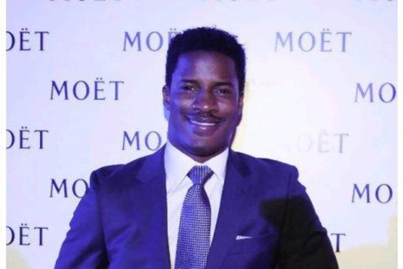 Nate Parker in his Sacoor Brothers suit. Courtesy L'agence France
